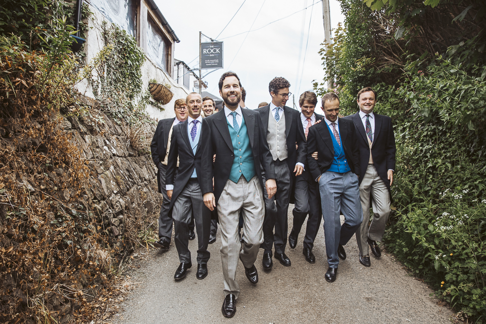 C+CMarlow-Groom-and-ushers-walking-to-Church